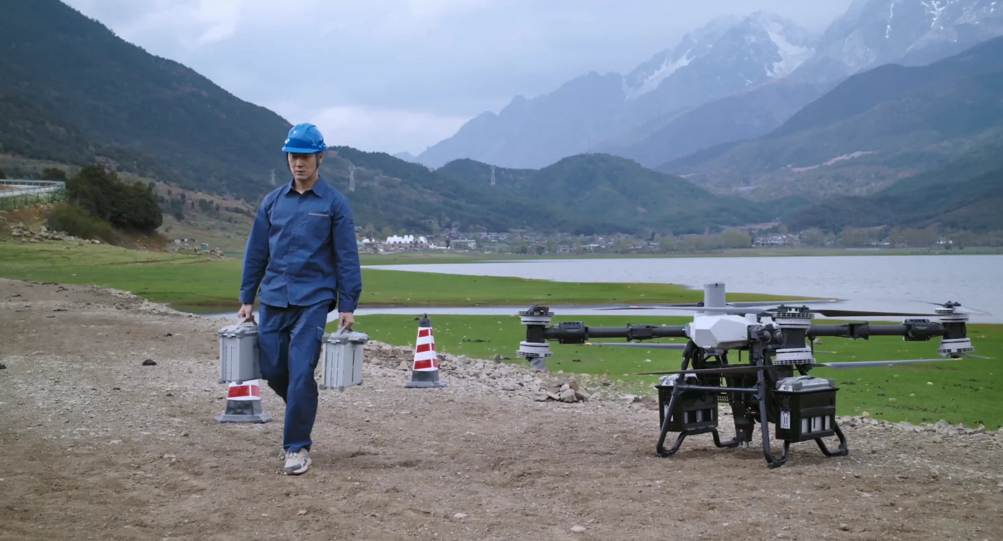DJI FlyCart 100 carrying heavy cargo on a delivery mission
